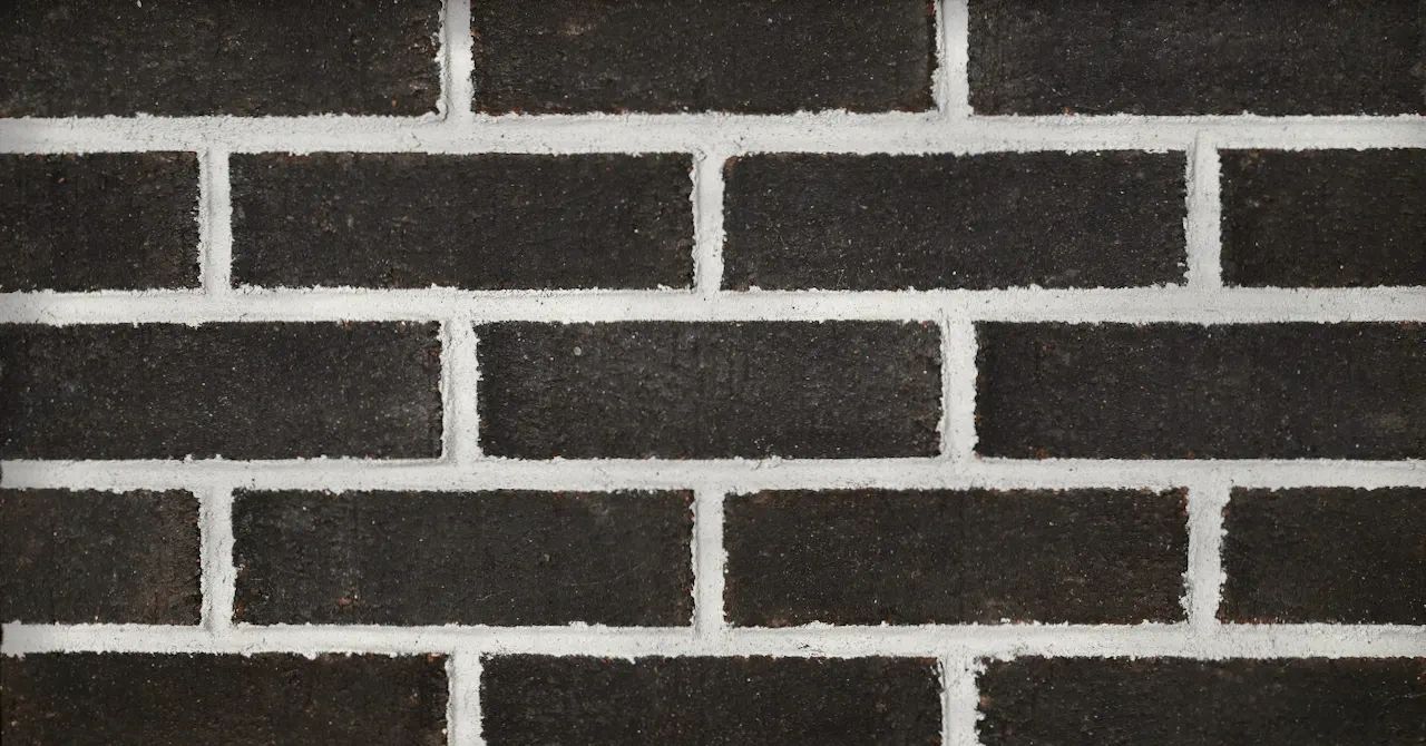 989 - Black Sand Finish on Black Body — 989 - Black Sand Finish on Black Body — Material sample