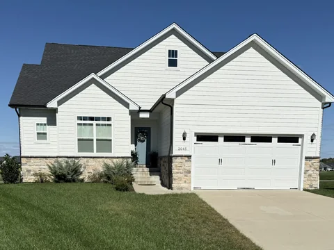 Stone accents with white siding