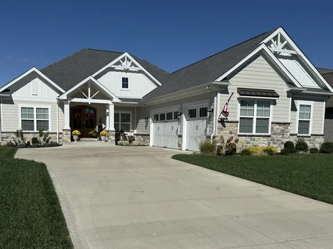 Stone accents at a covered entry